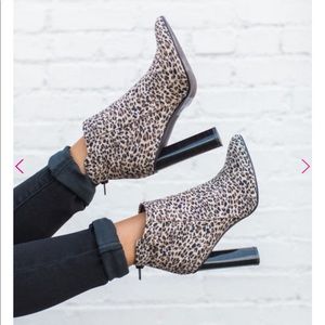 Cheetah print boots.